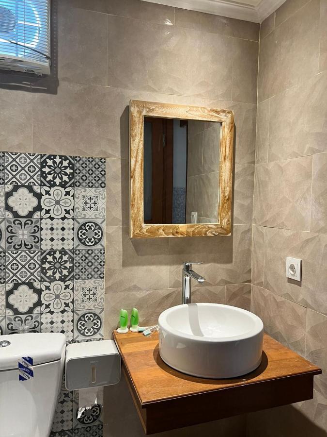 D'Leisure Guest House أونغاسان المظهر الخارجي الصورة