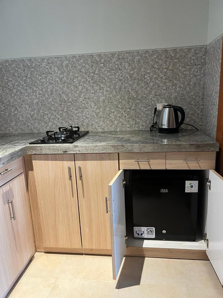 D'Leisure Guest House أونغاسان المظهر الخارجي الصورة